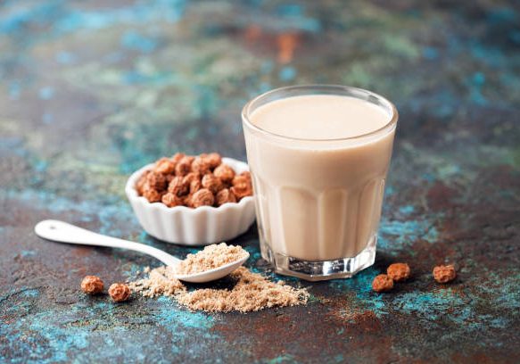 Homemade tiger nuts flour and milk, selective focus