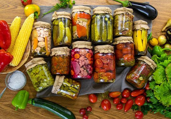 Preserving vegetables in jars in the kitchen. Selective focus. Food.